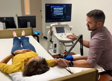 Dallin Tavoian using ultrasound